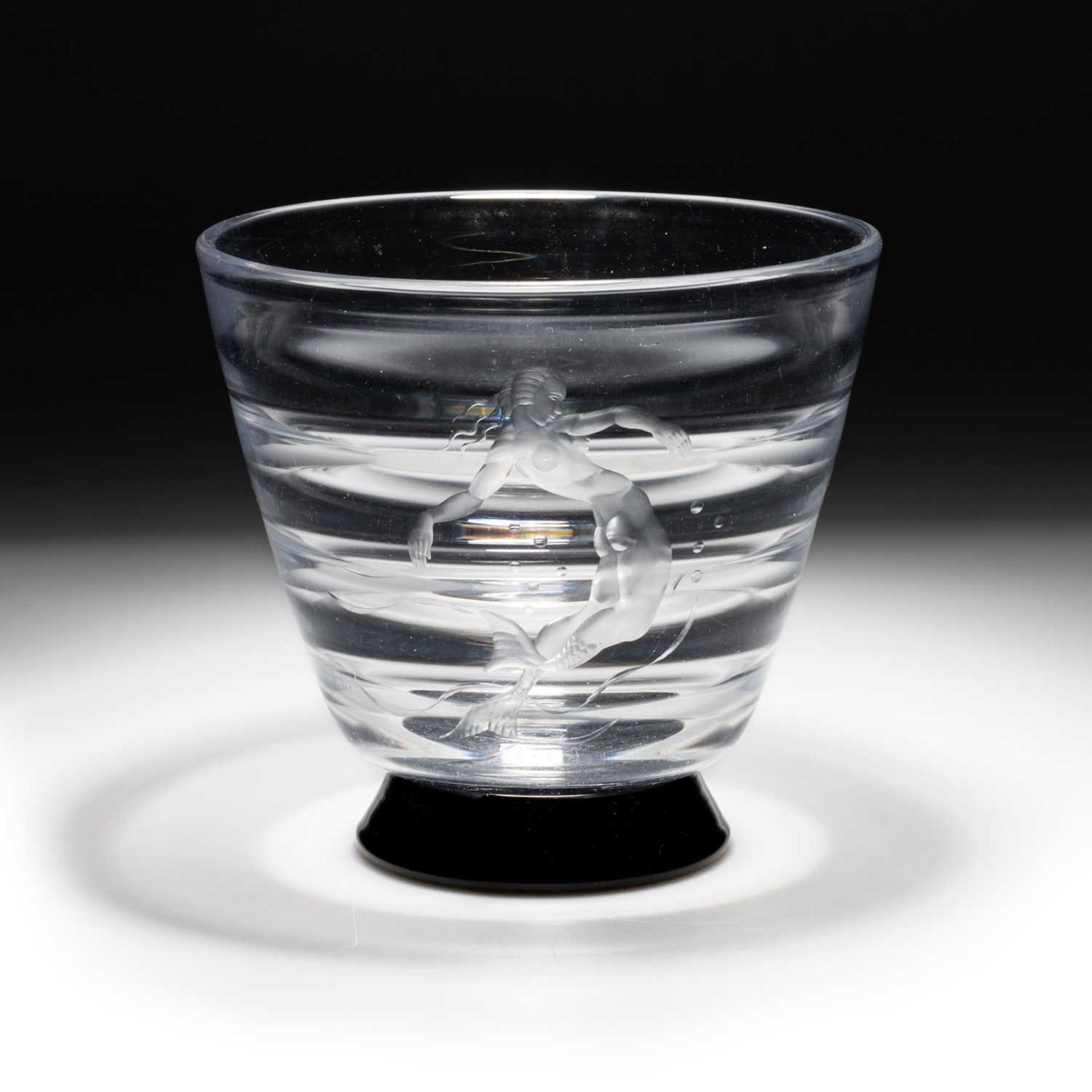 SIMON GATE FOR ORREFORS, AN OPTIC BLOWN VASE WITH BLACK GLASS BASE, CIRCA 1930S