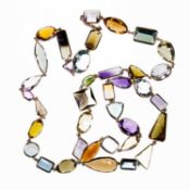 AN 18K YELLOW GOLD AND MULTI GEMSTONE NECKLACE