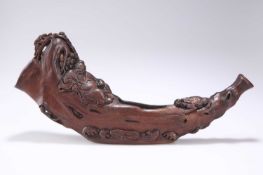 A CHINESE CARVED WOOD HORN-SHAPED BOAT