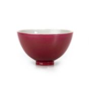 A CHINESE RED-GLAZED TEA BOWL