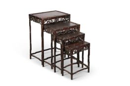 A QUARTET OF CHINESE ROSEWOOD NESTING TABLES, LATE 19TH CENTURY