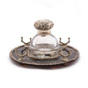 AN EDWARDIAN SILVER AND TORTOISESHELL INKWELL