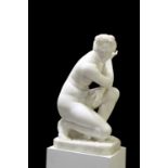 AFTER THE ANTIQUE, A CARVED WHITE MARBLE FIGURE, 'CROUCHING VENUS', 19TH CENTURY