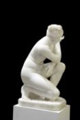 AFTER THE ANTIQUE, A CARVED WHITE MARBLE FIGURE, 'CROUCHING VENUS', 19TH CENTURY