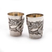A SMALL PAIR OF CHINESE SILVER CUPS