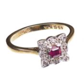 AN 18 CARAT YELLOW GOLD RUBY AND DIAMOND SQUARE CLUSTER RING