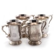 A SET OF FOUR GEORGE III SILVER TWO-HANDLED CUPS