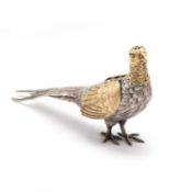 A GERMAN SILVER AND SILVER-GILT PEPPERETTE, IN THE FORM OF A PHEASANT