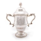 A GEORGE III SILVER TWO-HANDLED CUP AND COVER