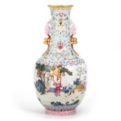 A CHINESE TURQUOISE-GROUND FAMILLE ROSE 'BOYS AT PLAY' VASE