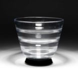 SIMON GATE FOR ORREFORS, AN OPTIC BLOWN VASE WITH BLACK GLASS BASE, CIRCA 1930S