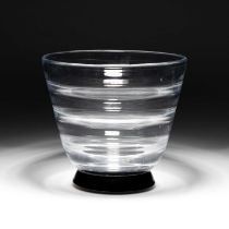 SIMON GATE FOR ORREFORS, AN OPTIC BLOWN VASE WITH BLACK GLASS BASE, CIRCA 1930S