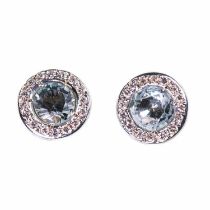 A PAIR OF AQUAMARINE AND DIAMOND CIRCULAR CLUSTER EARRINGS