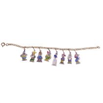 DISNEY INTEREST: A CHARM BRACELET WITH ENAMELLED CHARMS