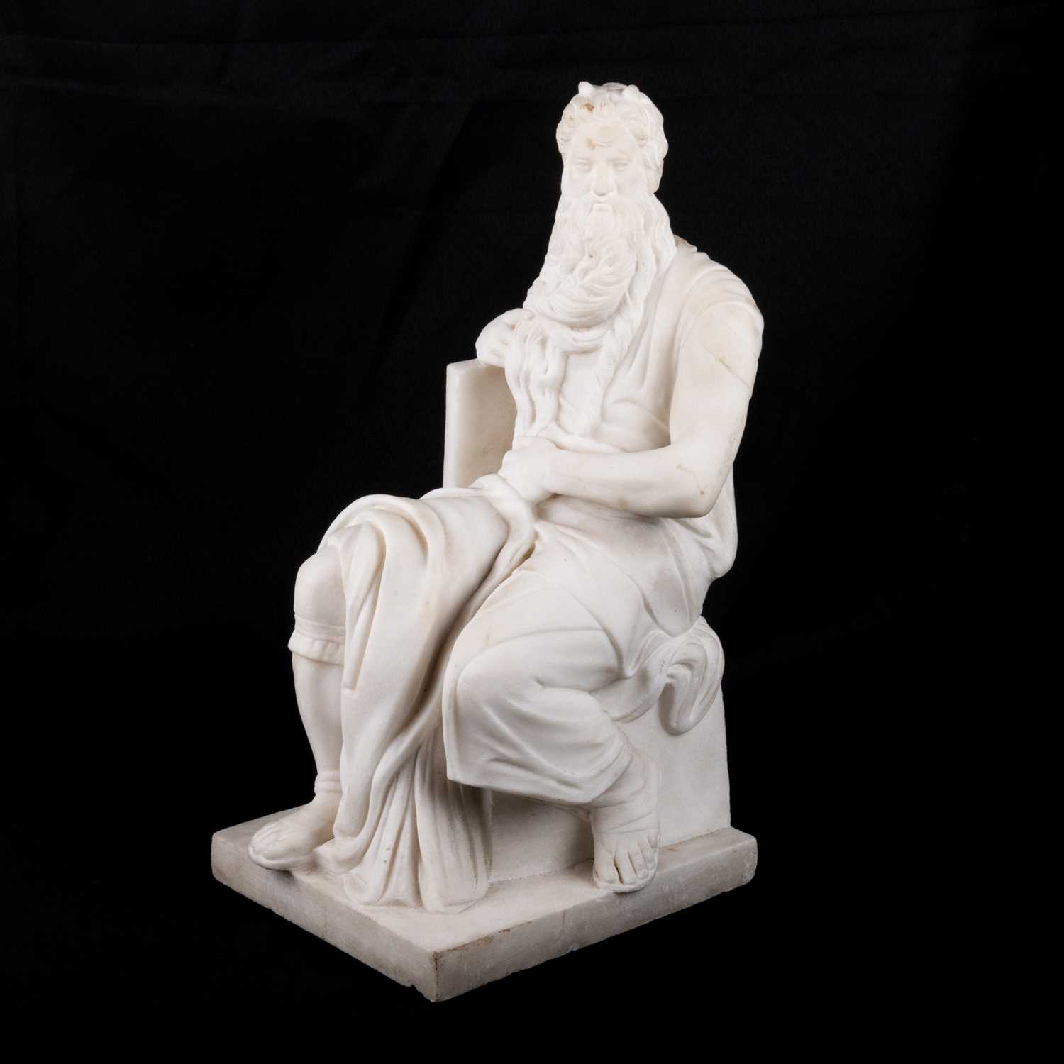 AFTER MICHELANGELO, A CARVED MARBLE FIGURE OF MOSES