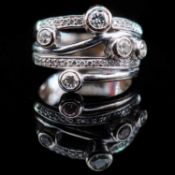 AN 18CT WHITE GOLD AND DIAMOND DRESS RING