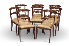A SET OF EIGHT REGENCY ROSEWOOD DINING CHAIRS