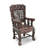 A 19TH CENTURY CHINESE CARVED HARDWOOD ARMCHAIR