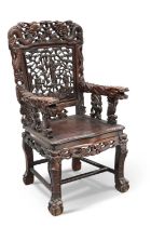 A 19TH CENTURY CHINESE CARVED HARDWOOD ARMCHAIR