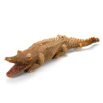 A LARGE AND UNUSUAL CARVED WOODEN CROCODILE