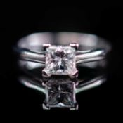 A PLATINUM AND DIAMOND SOLITAIRE RING