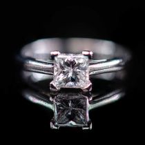 A PLATINUM AND DIAMOND SOLITAIRE RING