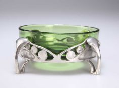 ARCHIBALD KNOX (1864-1933) FOR LIBERTY & CO, A TUDRIC PEWTER AND GREEN GLASS DISH