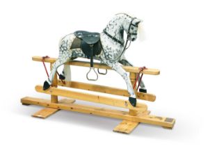 A 20TH CENTURY CARVED AND PAINTED WOODEN ROCKING HORSE