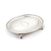 A GEORGE III SILVER TEAPOT STAND