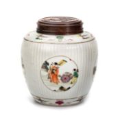 A CHINESE FAMILLE ROSE FLUTED GINGER JAR AND COVER