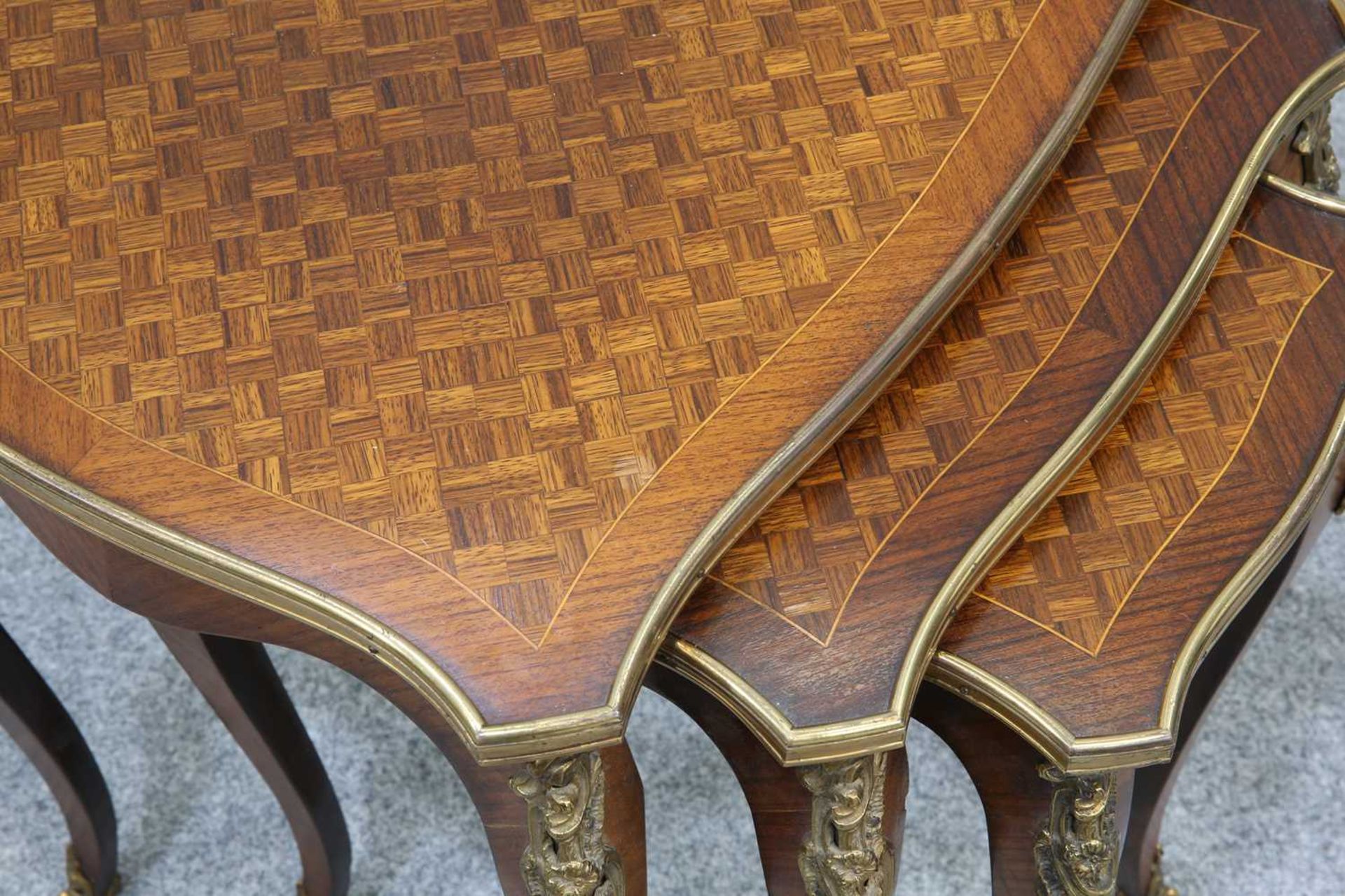A SET OF THREE LOUIS XV STYLE GILT-METAL MOUNTED PARQUETRY NESTING TABLES, MID-20TH CENTURY - Image 2 of 2