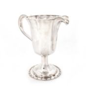 OMAR RAMSDEN: A LARGE ARTS AND CRAFTS SILVER EWER