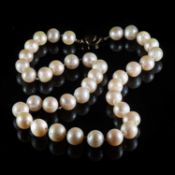 A SINGLE ROW CULTURED PEARL NECKLACE
