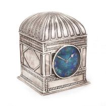 AN ARTS AND CRAFTS SILVER AND ENAMEL MANTEL CLOCK