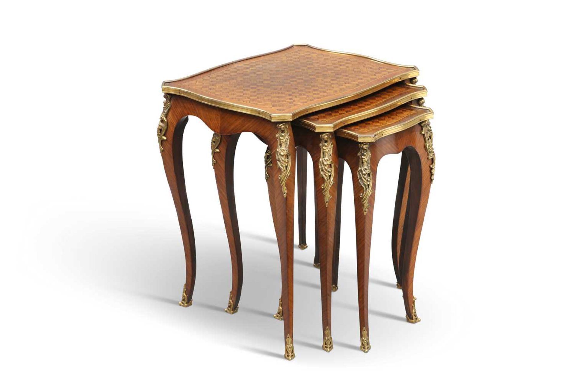 A SET OF THREE LOUIS XV STYLE GILT-METAL MOUNTED PARQUETRY NESTING TABLES, MID-20TH CENTURY