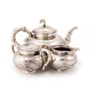A CHINESE SILVER THREE-PIECE TEA SERVICE