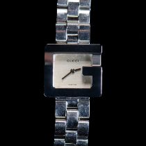 A LADY'S STEEL GUCCI "G" BRACELET WATCH