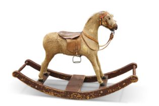 A VICTORIAN GOATSKIN-COVERED ROCKING HORSE