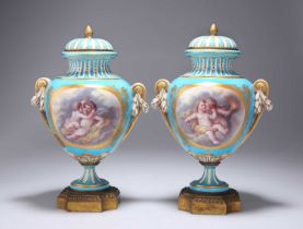 A PAIR OF SÈVRES STYLE BLEU CELESTE VASES AND COVERS, 19TH CENTURY