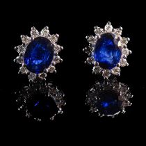 A PAIR OF 18K WHITE GOLD, SAPPHIRE AND DIAMOND OVAL CLUSTER EARRINGS