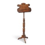 A VICTORIAN PITCH PINE ADJUSTABLE LECTERN