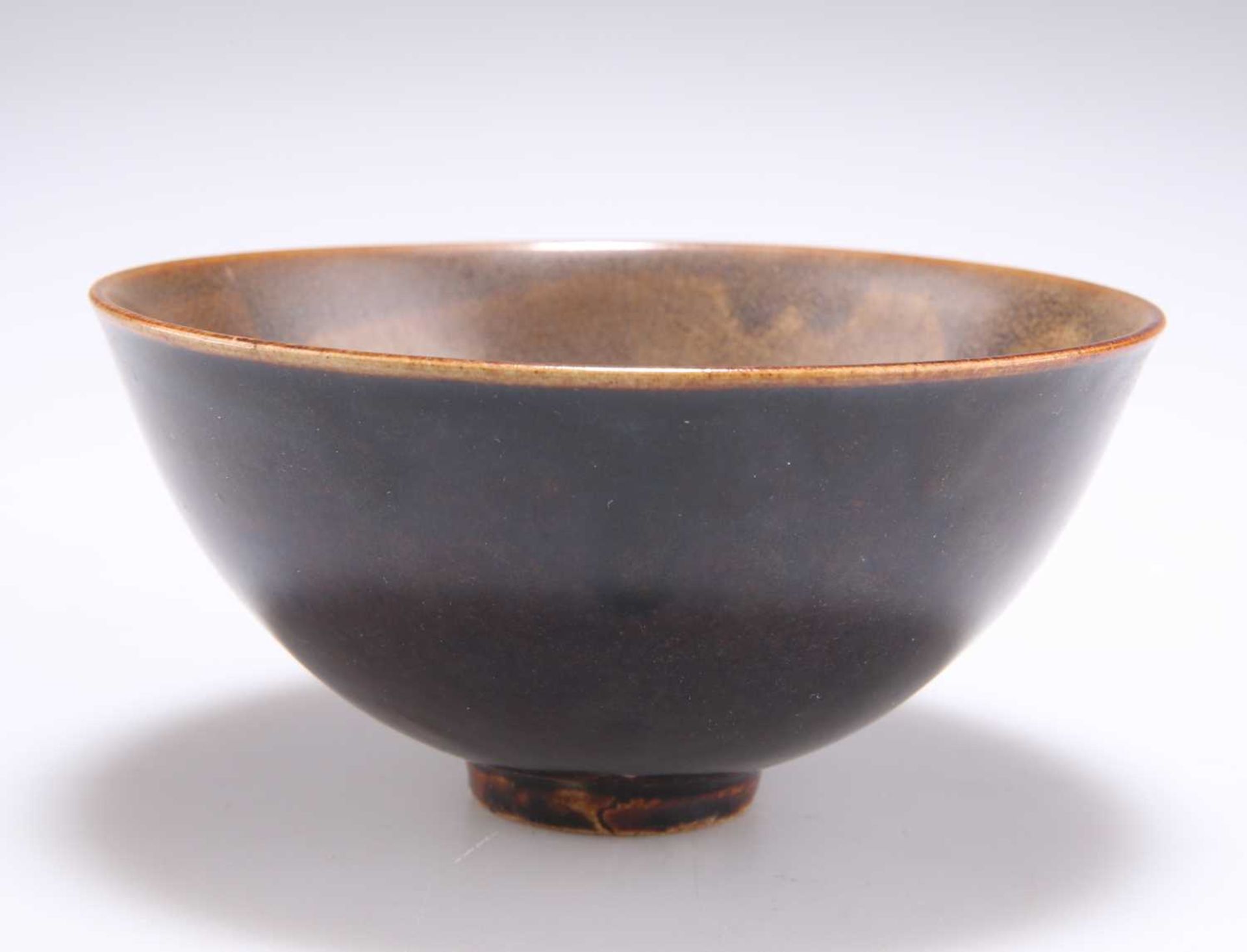 A CHINESE TEADUST-GLAZED BOWL