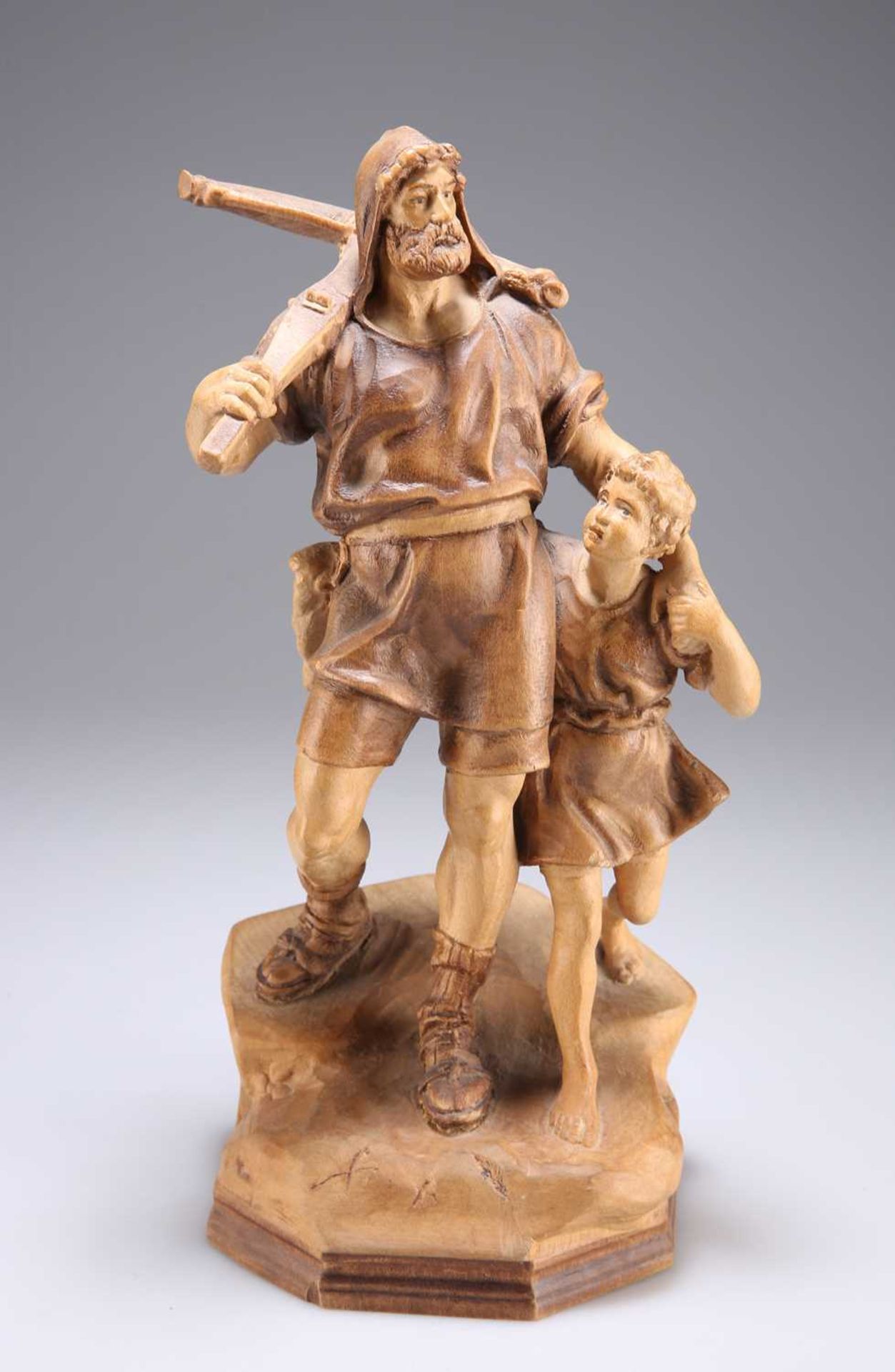 A SWISS CARVED FIGURE GROUP OF WILLIAM TELL AND HIS SON, CIRCA 1900