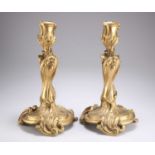 A PAIR OF ROCOCO REVIVAL ORMOLU CANDLESTICKS, 19TH CENTURY