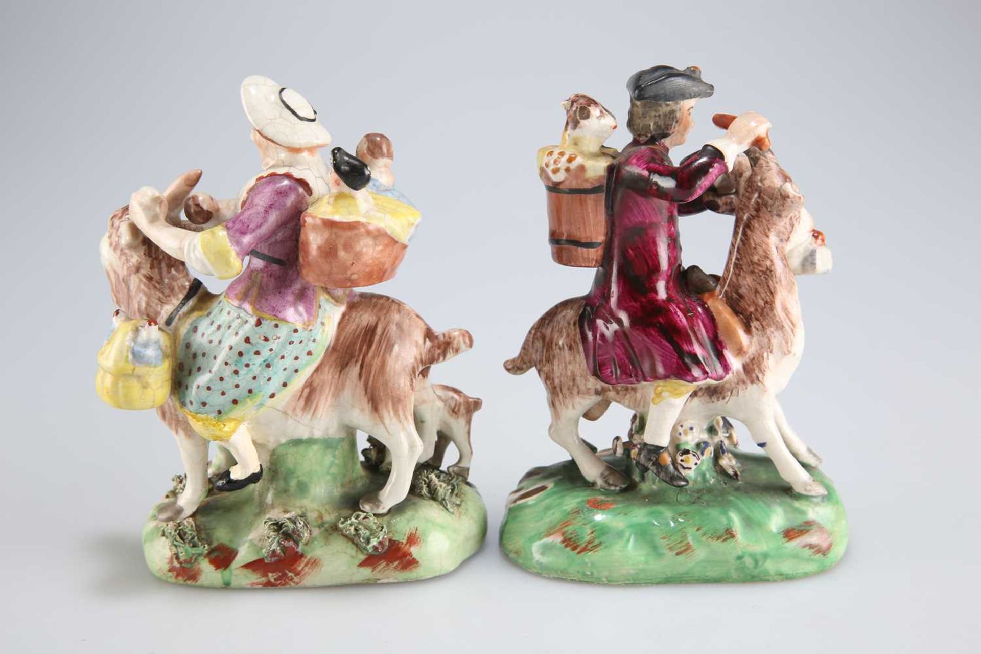 A PAIR OF STAFFORDSHIRE FIGURES OF THE WELSH TAILOR AND HIS WIFE, EARLY 19TH CENTURY - Bild 2 aus 2