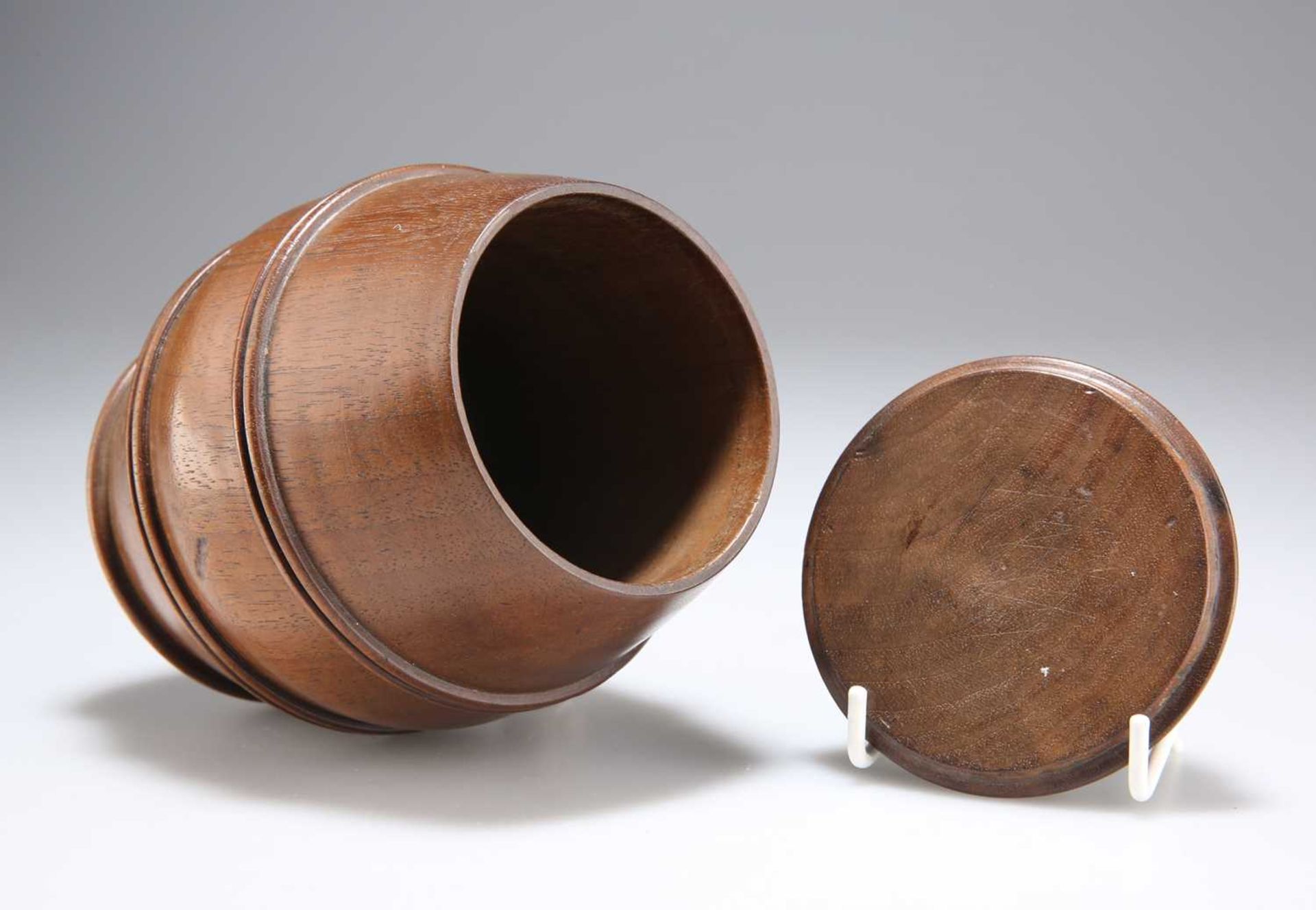 A 19TH CENTURY TURNED WALNUT BARREL-FORM SPICE BOX