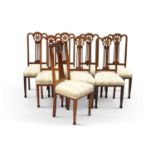 A SET OF EIGHT ARTS AND CRAFTS STYLE INLAID MAHOGANY DINING CHAIRS