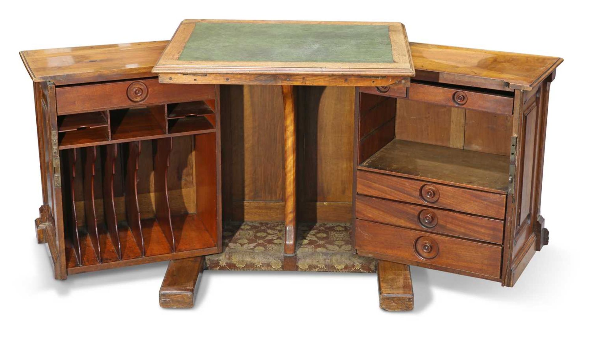 A VICTORIAN WALNUT 'WOOTON' DESK, BY T. SIMPSON & SON OF HALIFAX, CIRCA 1870