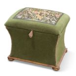 A VICTORIAN WALNUT AND NEEDLEWORK OTTOMAN