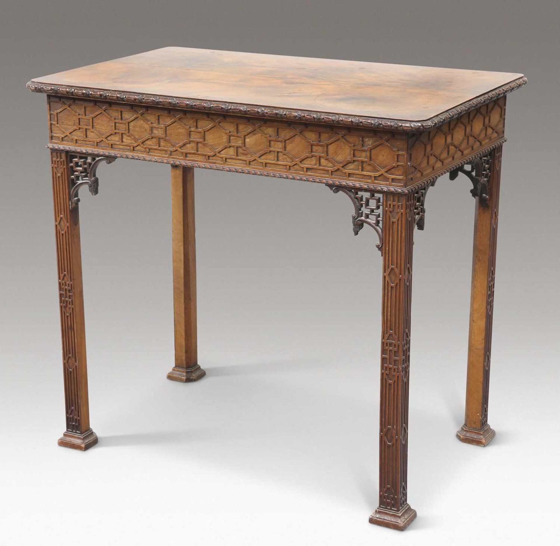 A CHIPPENDALE STYLE MAHOGANY SILVER TABLE, LABEL OF WYLIE & LOCHHEAD, CIRCA 1900